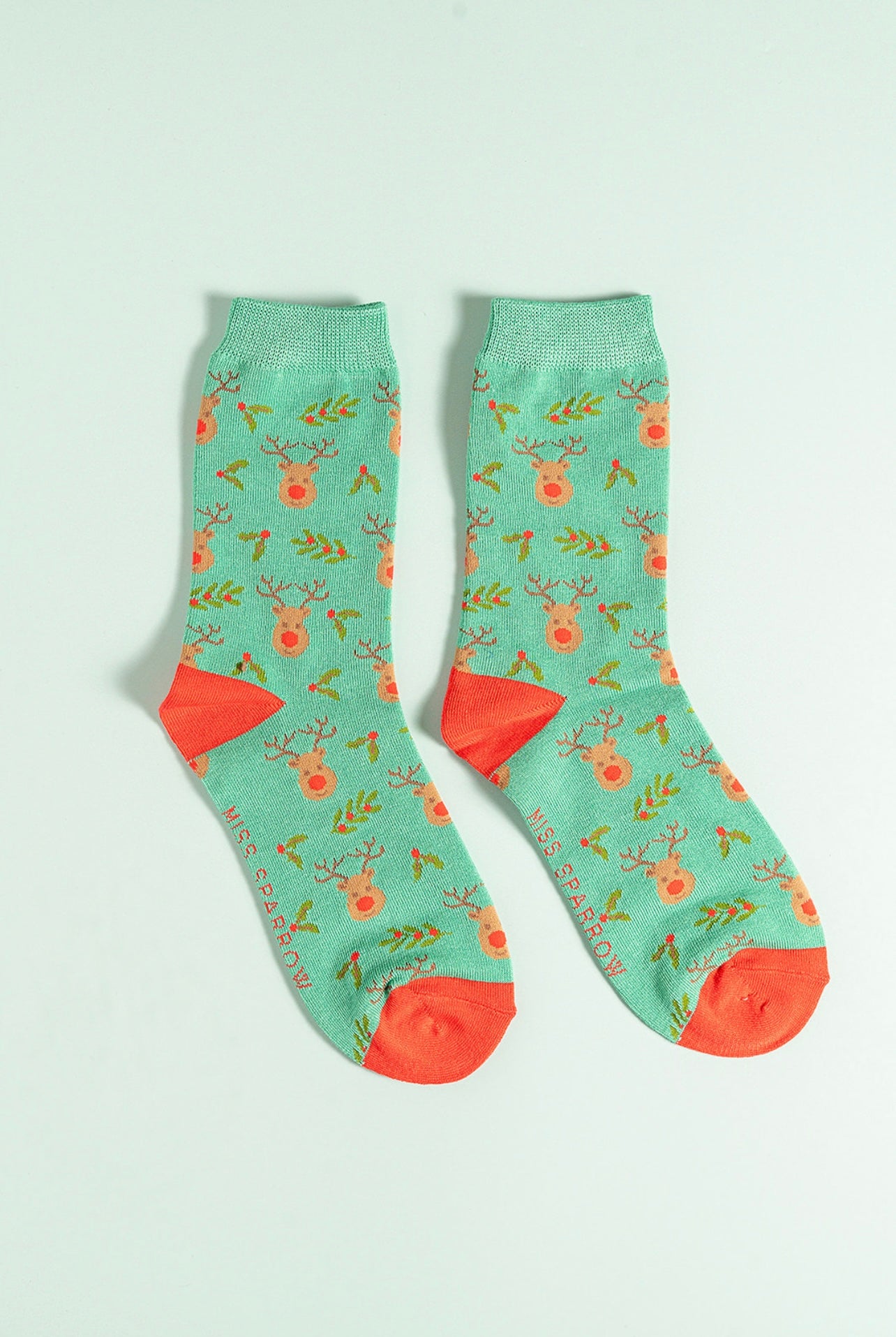 Green reindeer holly bamboo socks